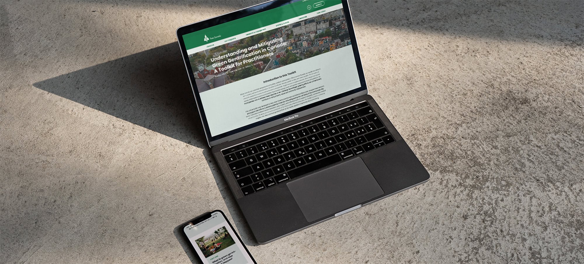 Tree Canada's Green Gentrification Toolkit resource shown on a Macbook Pro and an iPhone